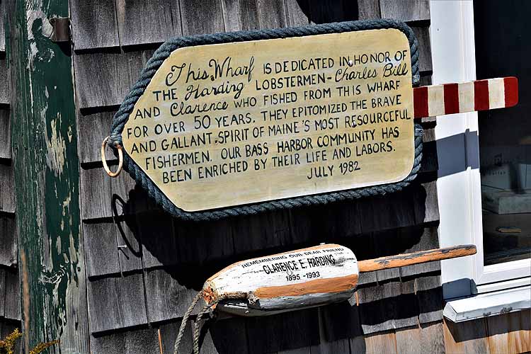 memorial sign on bldg